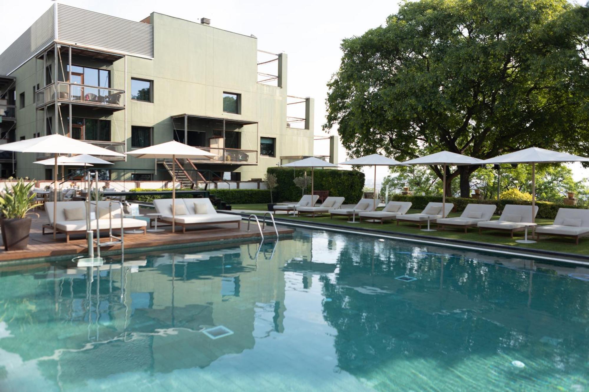 Hotel Miramar Barcelona Gl Buitenkant foto The swimming pool at the Hotel